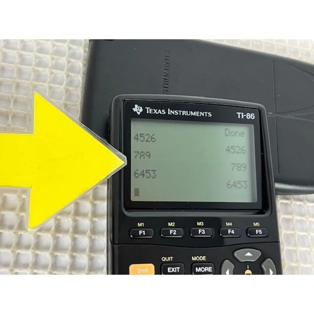 Texas Instruments Ti-86 Graphing Calculator-Works but has a line on screen‎